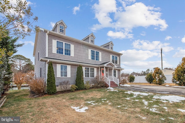 view of front facade with a front yard