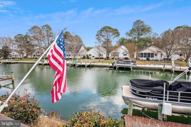 view of dock with a water view