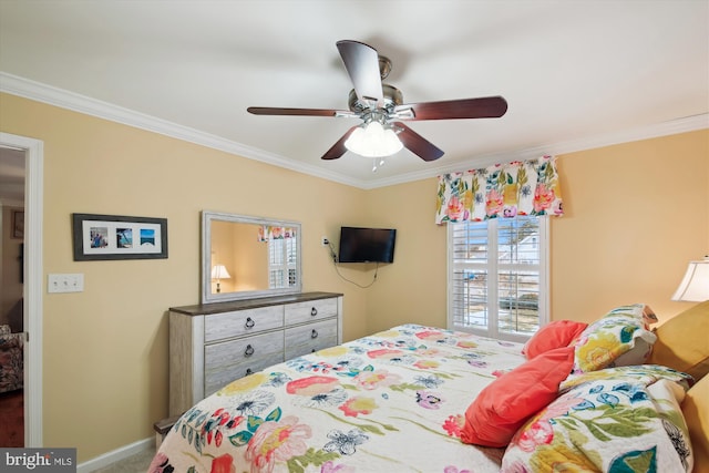 bedroom featuring crown molding and ceiling fan