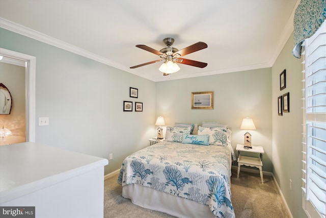 carpeted bedroom featuring ceiling fan and ornamental molding