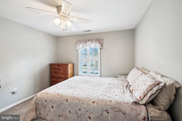 bedroom featuring ceiling fan and carpet floors