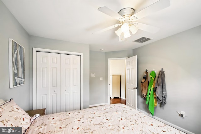 unfurnished bedroom featuring a closet and ceiling fan