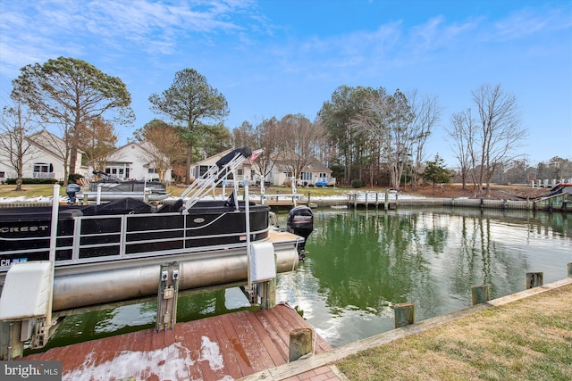 dock area featuring a water view