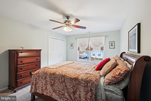 bedroom featuring light carpet, a closet, and ceiling fan