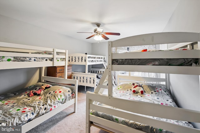 bedroom with ceiling fan and carpet