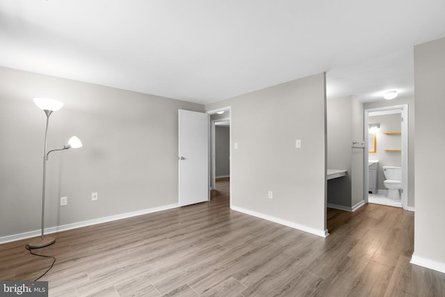 empty room featuring hardwood / wood-style floors