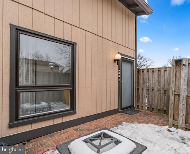 entrance to property with a patio area