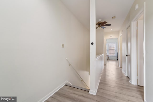 hall with light wood-type flooring