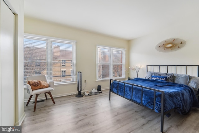 bedroom featuring light hardwood / wood-style flooring