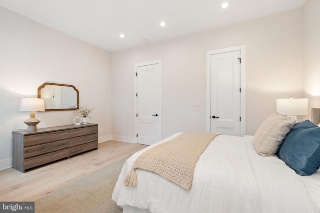 bedroom featuring light wood-type flooring