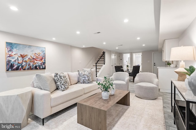 living room with light hardwood / wood-style floors