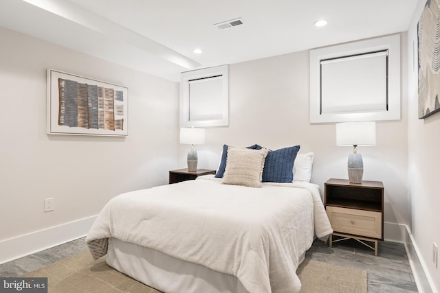 bedroom with hardwood / wood-style flooring