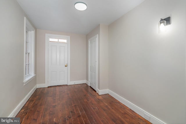 interior space featuring dark wood-type flooring