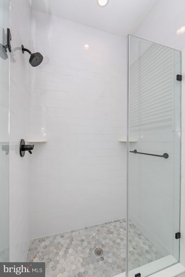 bathroom featuring walk in shower