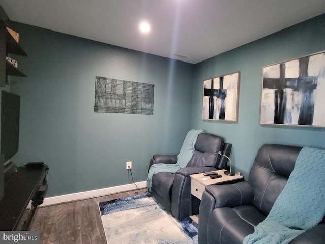 sitting room featuring hardwood / wood-style floors