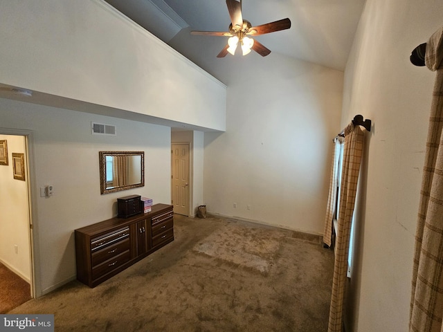 living room with ceiling fan, carpet flooring, and high vaulted ceiling