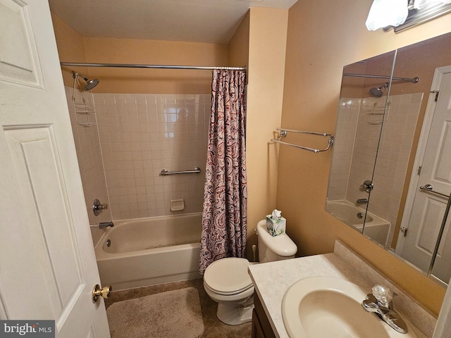 full bathroom with shower / tub combo, vanity, tile patterned floors, and toilet