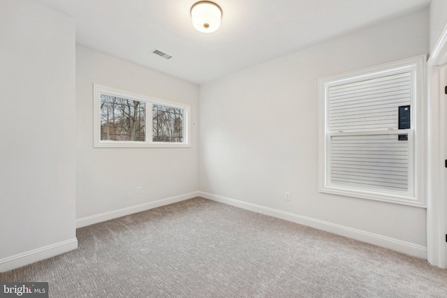 view of carpeted spare room