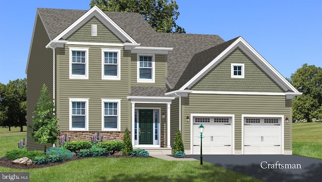 craftsman-style home featuring a garage and a front lawn