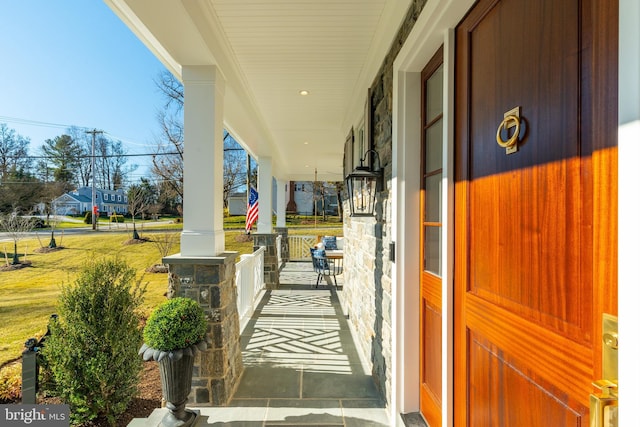 view of patio featuring a porch