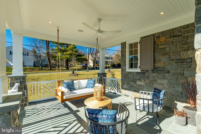 view of patio with ceiling fan