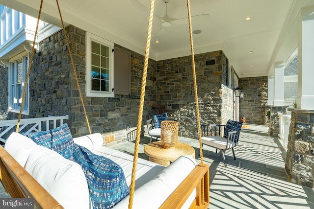 view of patio / terrace featuring ceiling fan and an outdoor hangout area