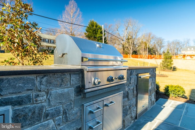 view of patio / terrace featuring area for grilling and exterior kitchen