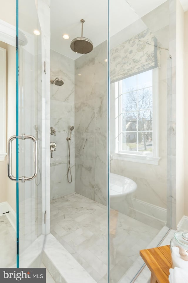 bathroom featuring walk in shower