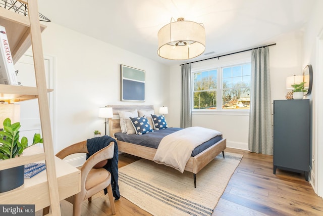 bedroom featuring hardwood / wood-style flooring