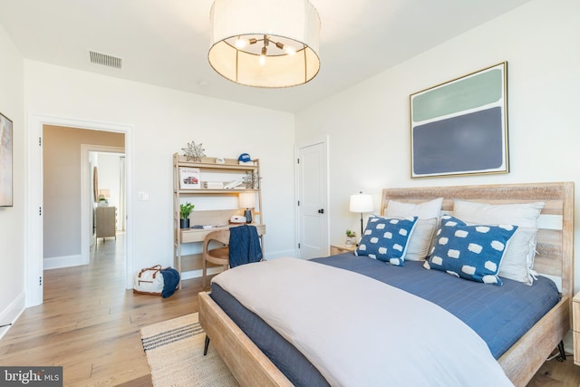 bedroom featuring light wood-type flooring