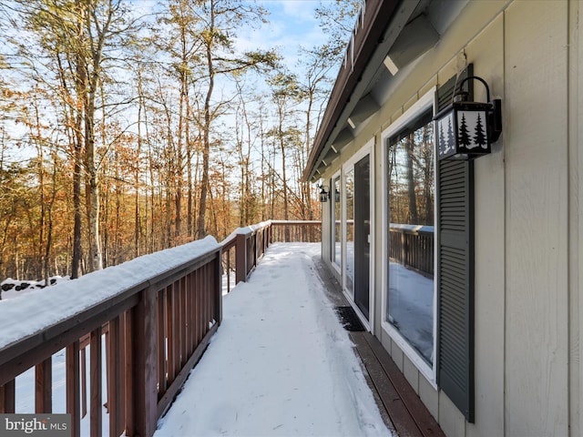 view of snow covered deck