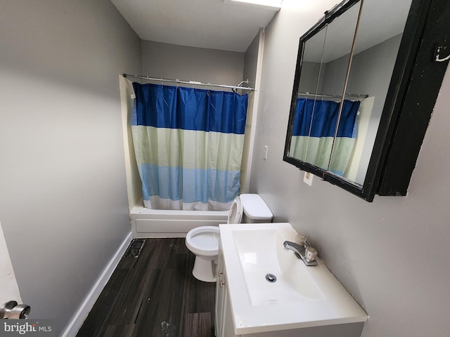 full bathroom featuring wood-type flooring, vanity, toilet, and shower / bathtub combination with curtain