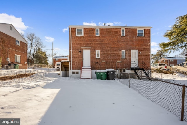 view of snow covered property