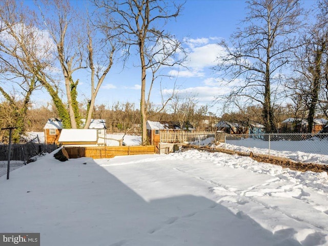 view of yard covered in snow