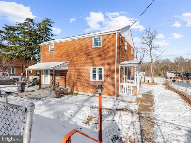 view of snow covered property