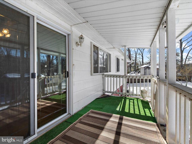 balcony featuring a porch