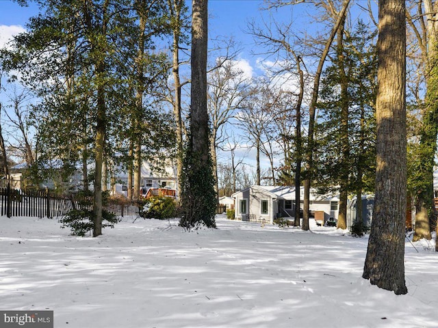 view of yard covered in snow