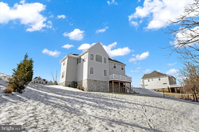 view of snow covered house