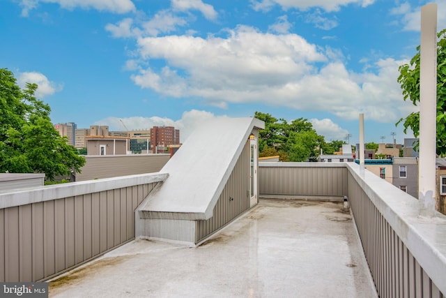 view of patio featuring a balcony