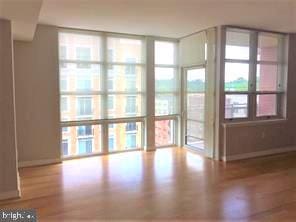 interior space featuring light hardwood / wood-style floors and expansive windows