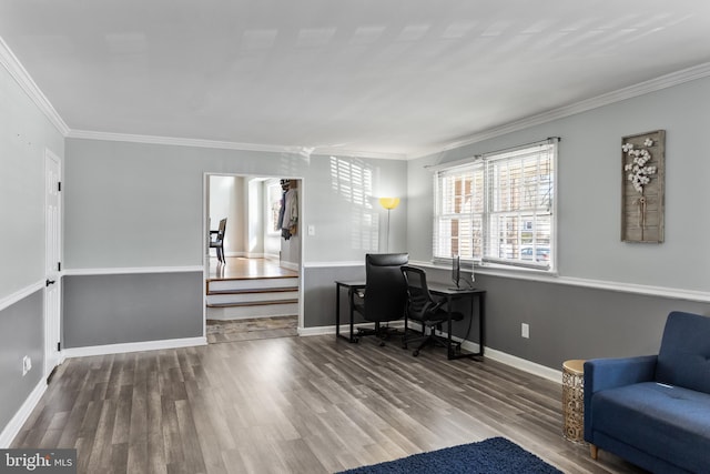 home office with hardwood / wood-style floors and ornamental molding