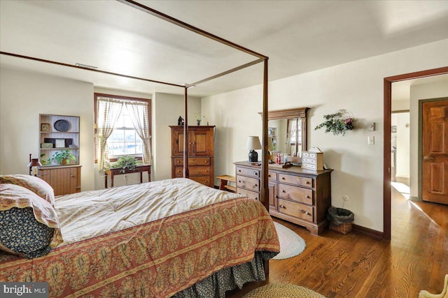 bedroom featuring hardwood / wood-style flooring