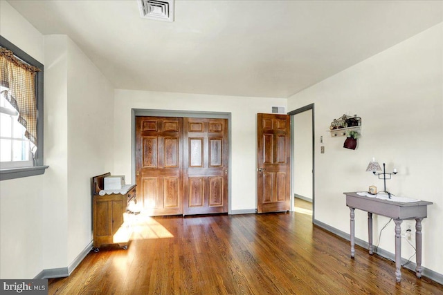 interior space featuring dark hardwood / wood-style flooring