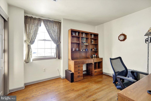 office area with hardwood / wood-style flooring