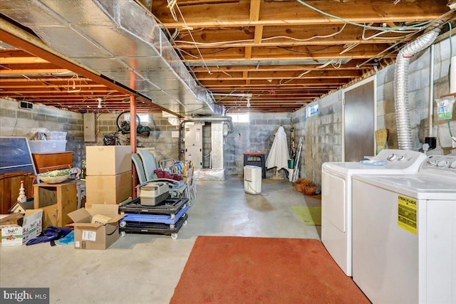 basement featuring washer and clothes dryer