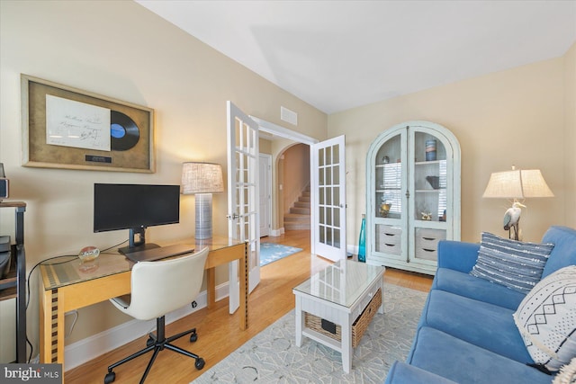 office area with french doors and wood-type flooring