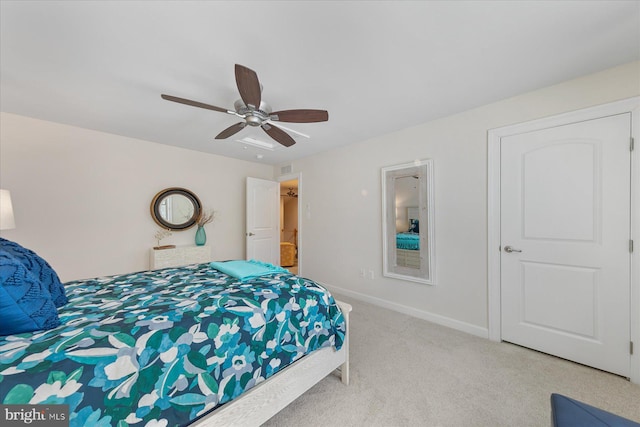 carpeted bedroom featuring ceiling fan