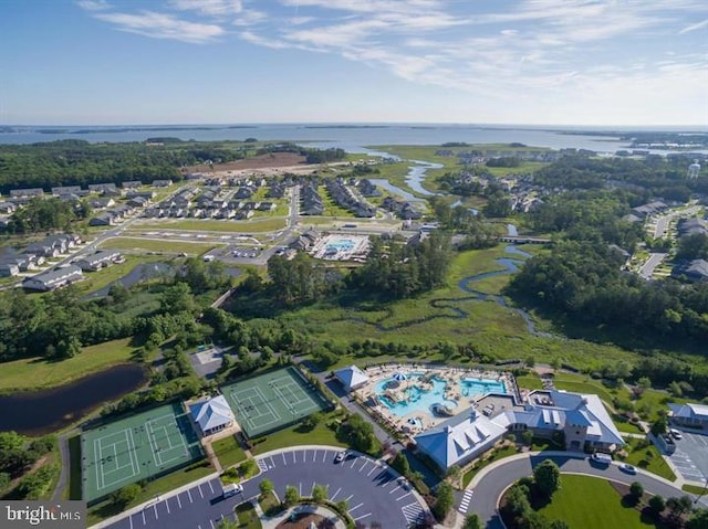 bird's eye view with a water view