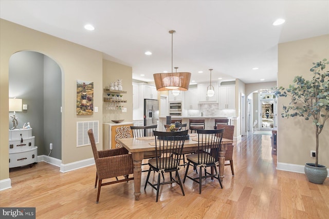 dining room featuring light wood-type flooring