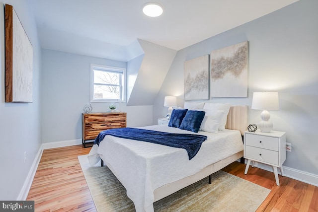 bedroom with light wood-type flooring